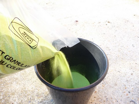 verser le sable vert grany de taille 0.2 -0.5